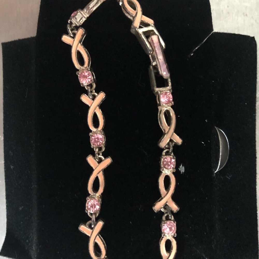 Avon breast cancer pink crystal link bracelet.